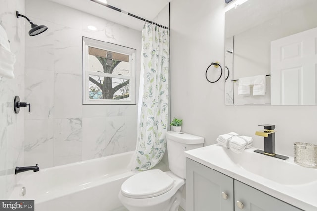 full bathroom featuring vanity, toilet, and shower / tub combo