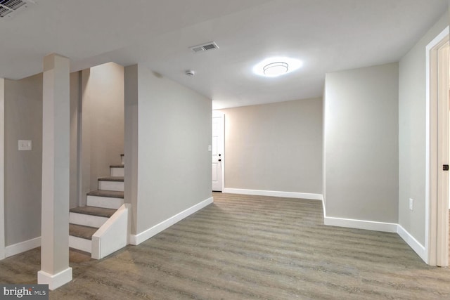 basement featuring hardwood / wood-style flooring