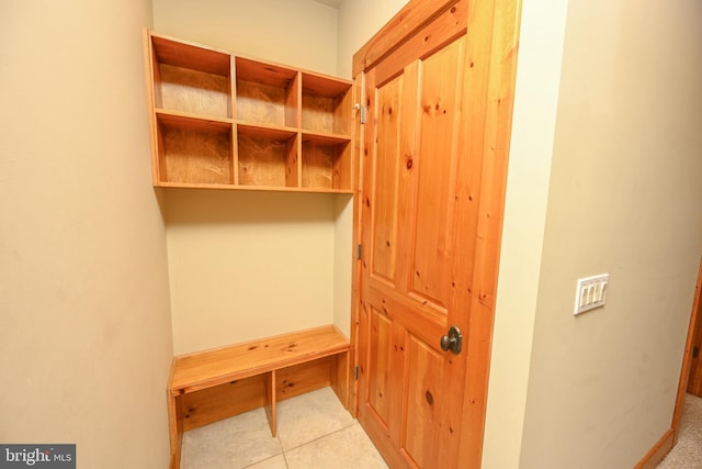 mudroom with light tile patterned floors