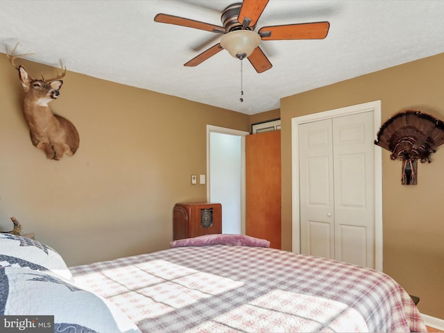 bedroom featuring a closet and ceiling fan