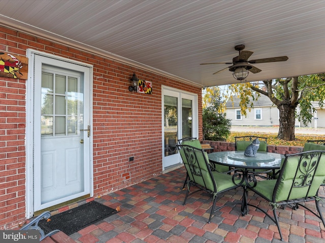 view of patio featuring ceiling fan