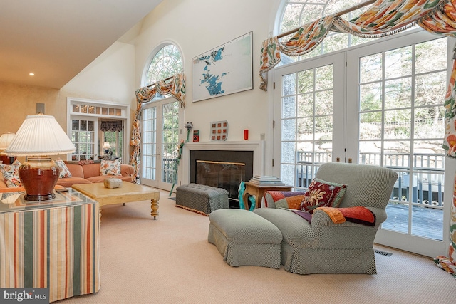 sitting room featuring carpet floors