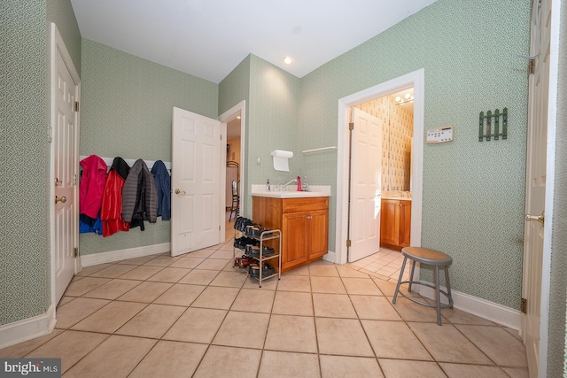 bathroom featuring vanity and tile patterned flooring