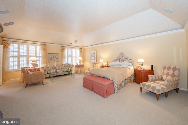 carpeted bedroom with lofted ceiling and ornamental molding