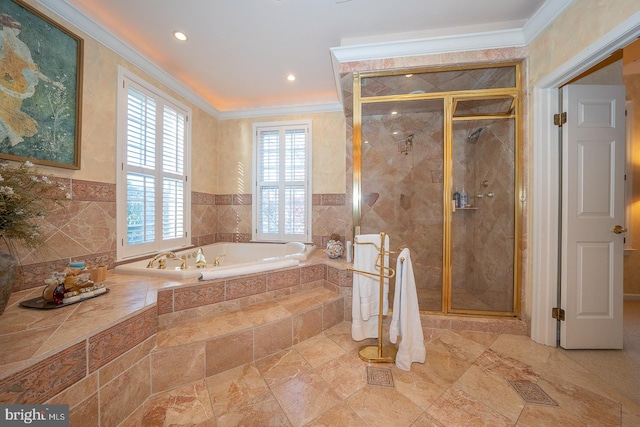 bathroom featuring ornamental molding and plus walk in shower