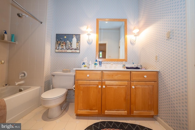 full bathroom with vanity, toilet, tile patterned flooring, and tiled shower / bath