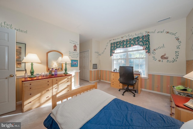 carpeted bedroom featuring a closet