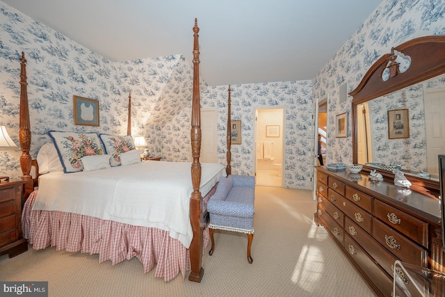 bedroom featuring light carpet