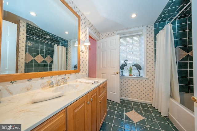 bathroom featuring vanity, tile patterned floors, and shower / bath combo