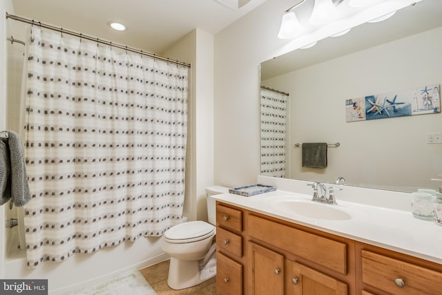 full bathroom featuring vanity, tile patterned flooring, toilet, and shower / tub combo