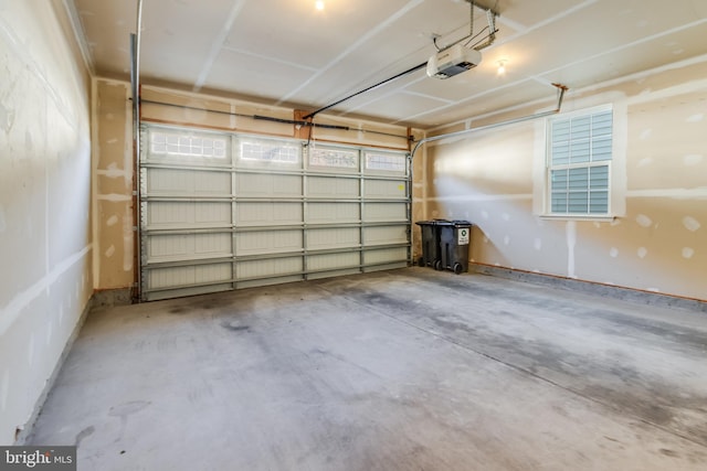 garage featuring a garage door opener