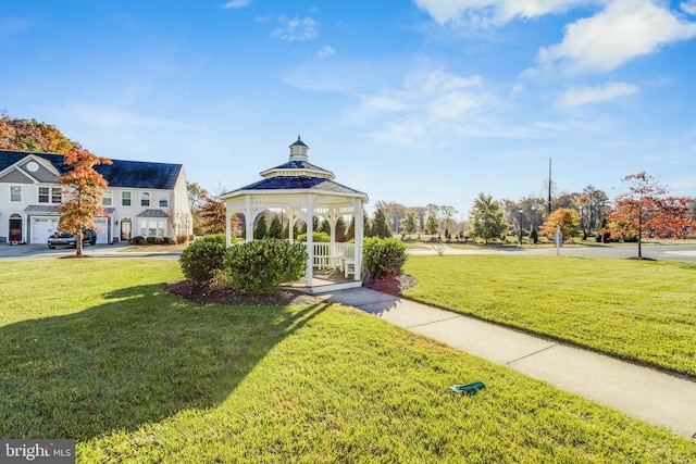 view of property's community featuring a gazebo and a lawn