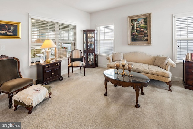 sitting room with light colored carpet