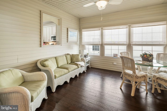 sunroom with wood ceiling and ceiling fan