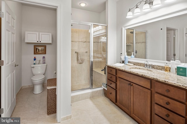 bathroom with toilet, walk in shower, vanity, and tile patterned floors