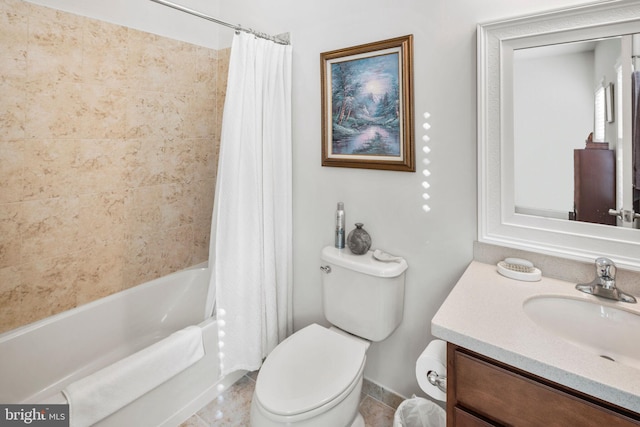 full bathroom featuring vanity, shower / bath combo with shower curtain, and toilet