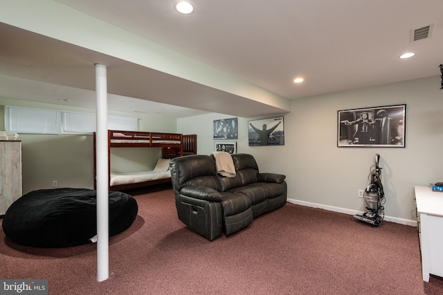 bedroom featuring dark colored carpet