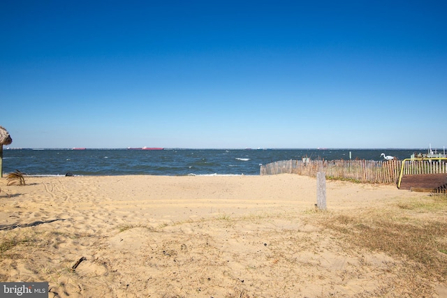 view of water feature with a beach view