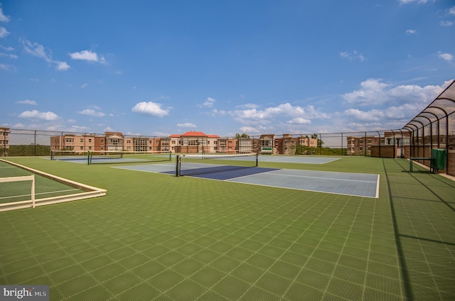 view of sport court with tennis court