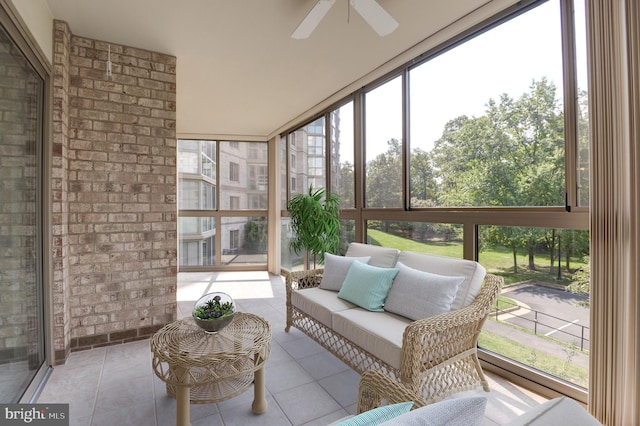 sunroom / solarium with ceiling fan and a wealth of natural light