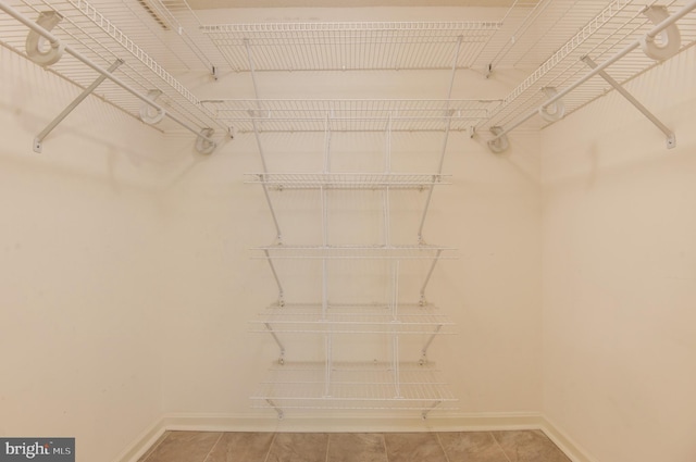 walk in closet featuring tile patterned floors