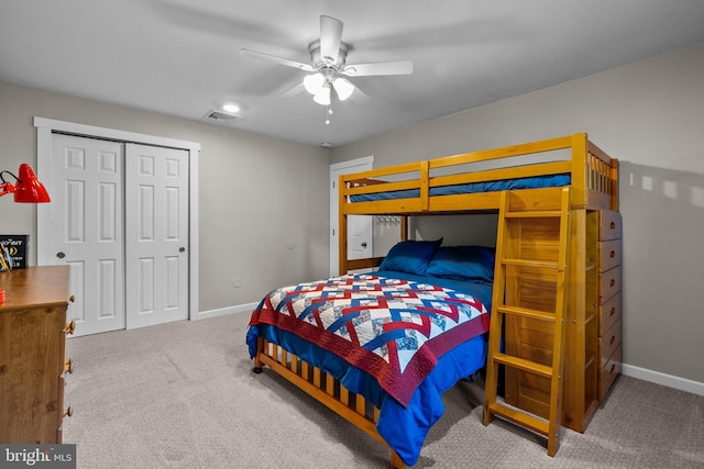 bedroom with carpet flooring, a closet, and ceiling fan