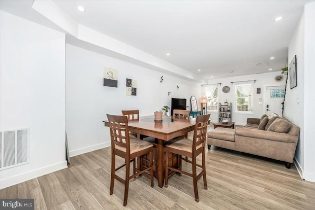 dining room with light hardwood / wood-style floors