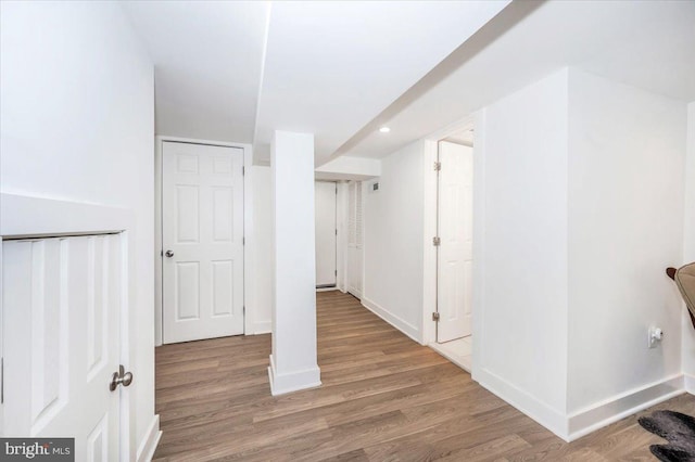 hallway featuring hardwood / wood-style floors