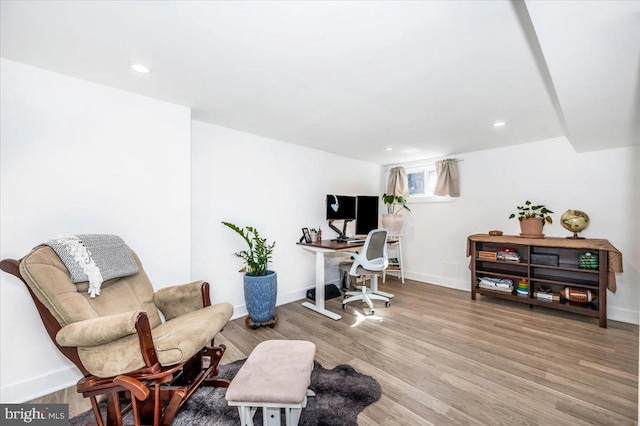 home office featuring hardwood / wood-style floors