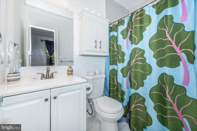 bathroom featuring vanity, toilet, tile patterned flooring, and a shower with shower curtain