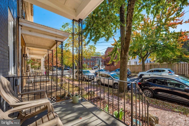 balcony featuring covered porch