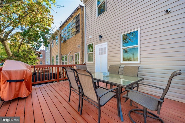 wooden terrace with grilling area