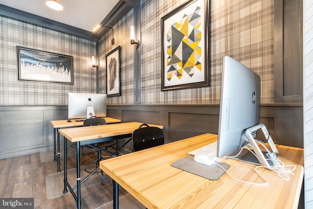 office area featuring wood finished floors, a wainscoted wall, a decorative wall, and wallpapered walls