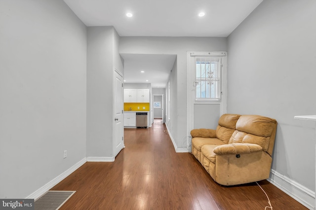 living area featuring dark hardwood / wood-style flooring