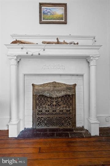 257-9 S 46th St, Philadelphia, PA 19139 - interior details with wood finished floors and a fireplace