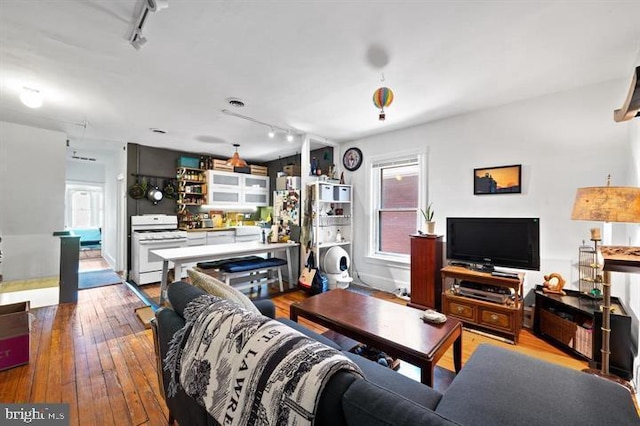 257-9 S 46th St, Philadelphia, PA 19139 - living room with hardwood / wood-style flooring and rail lighting
