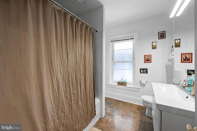 257-9 S 46th St, Philadelphia, PA 19139 - full bath with baseboards, a shower with shower curtain, toilet, and vanity