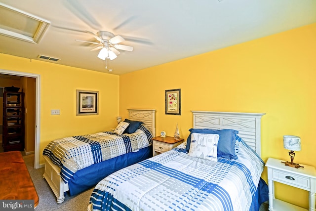 carpeted bedroom with ceiling fan