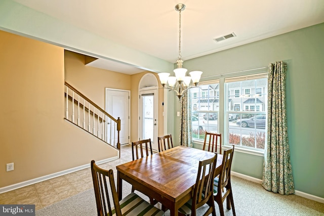 dining room with a chandelier