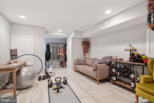 exercise room with recessed lighting and visible vents