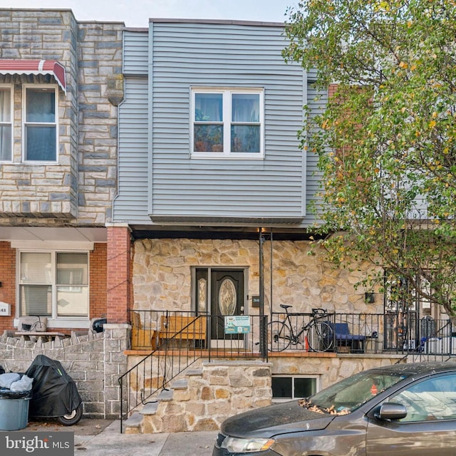 multi unit property with stone siding