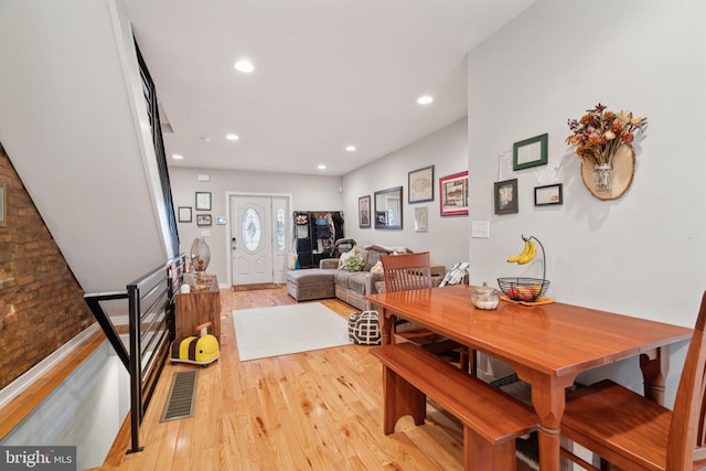 dining area with visible vents, recessed lighting, and light wood-style floors