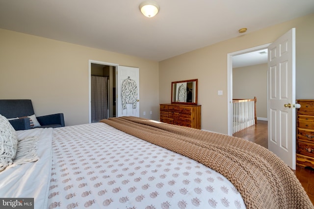 bedroom featuring dark hardwood / wood-style floors