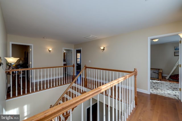 hallway featuring hardwood / wood-style floors