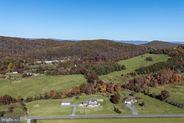 aerial view with a mountain view and a rural view