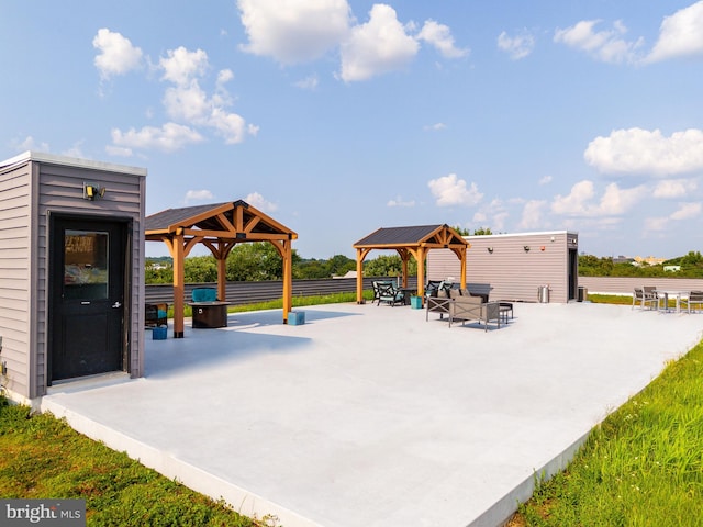 exterior space featuring a gazebo and a patio