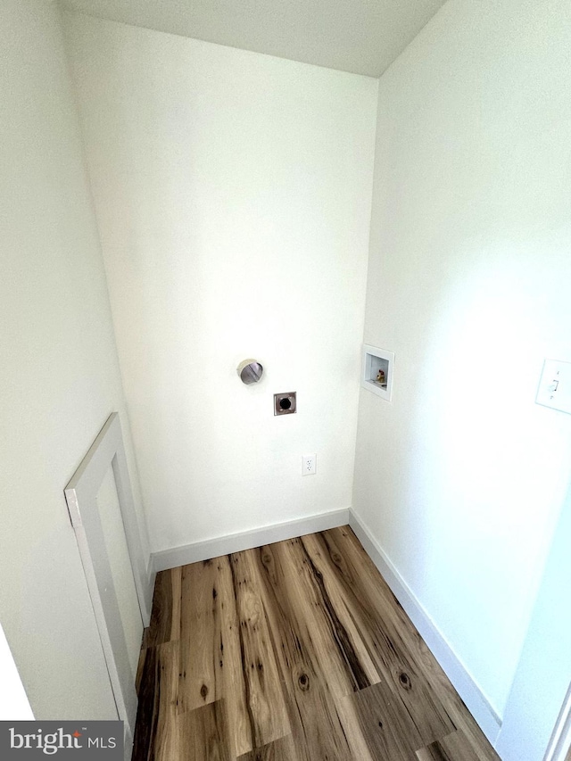 laundry area featuring washer hookup, wood-type flooring, and hookup for an electric dryer