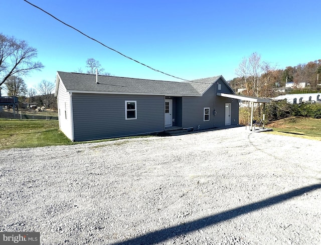 view of front of home with a front lawn