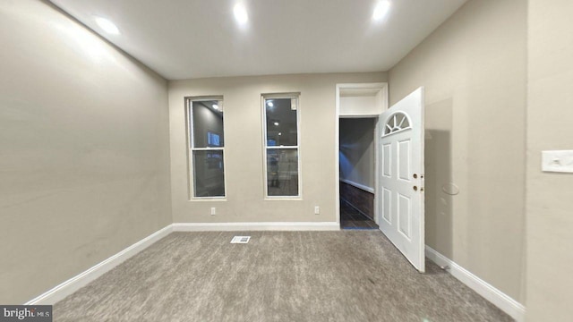 spare room featuring hardwood / wood-style floors