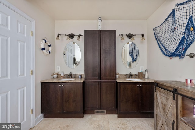 bathroom featuring vanity